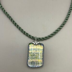 Elegant Necklace with Green Cord and Iridescent Fused Glass Pendant